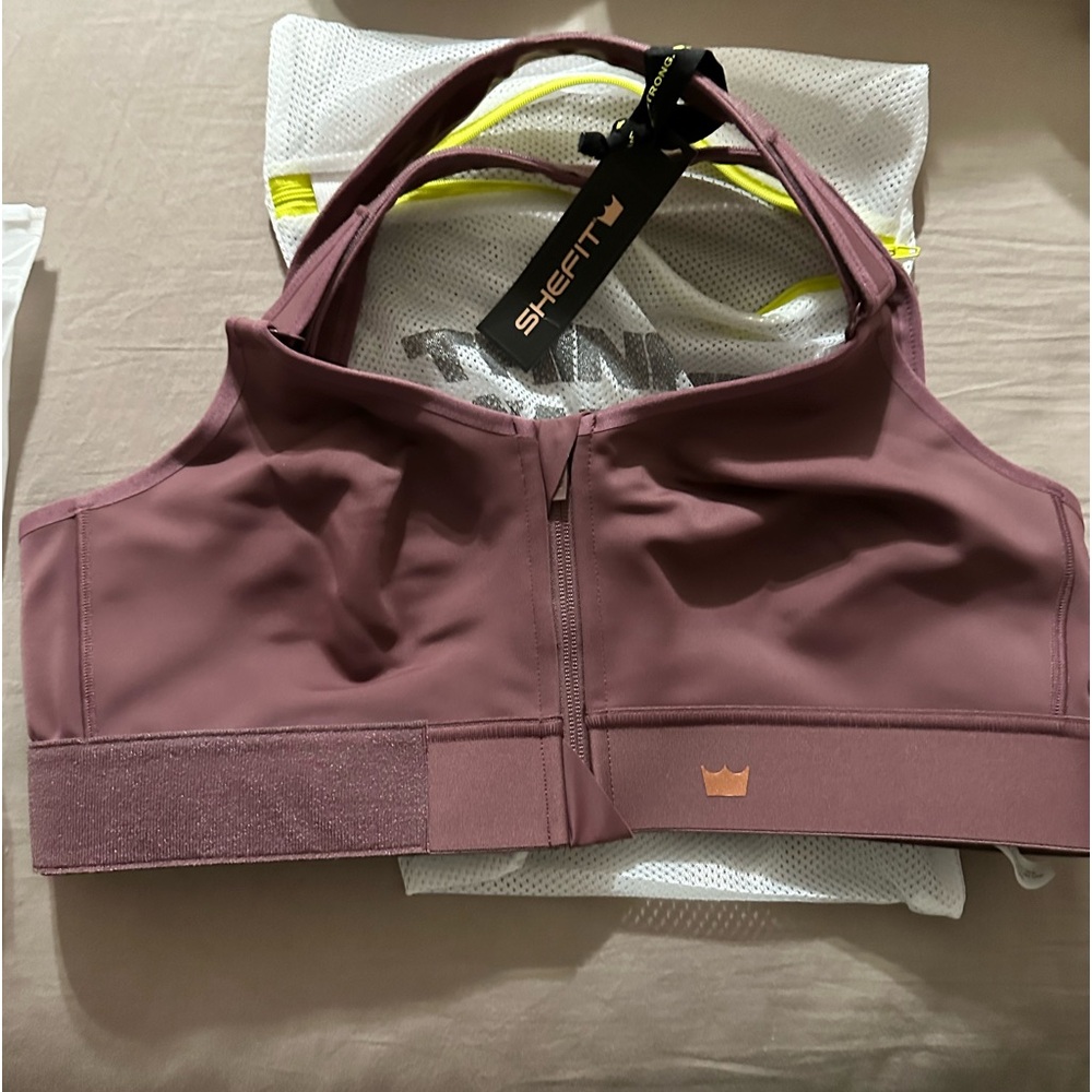 Size 1 luxe SheFit sports bra. New condition, never worn.